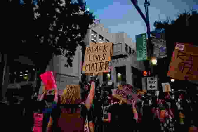 A Group Of People Holding Signs Advocating For Social Justice, Representing The Ongoing Struggle For Equality The Civic Constitution: Civic Visions And Struggles In The Path Toward Constitutional Democracy