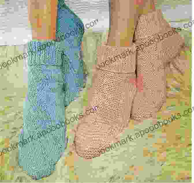 A Pair Of Intricate And Elegant Pattern Bed Socks In A Soft Shade Of Gray, Adorned With A Delicate Lace Pattern. Plymouth F073 Baby Alpaca DK Yarn Pattern Bed Socks (I Want To Knit)