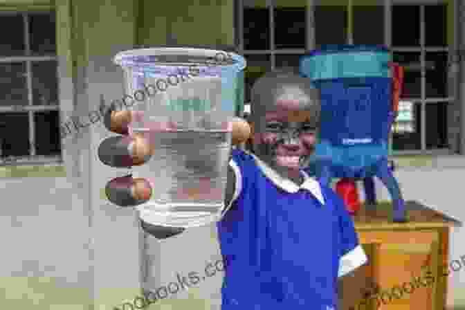 A Photo Of A Child Drinking Water From A Well In Africa Rain Dr Edward Bell