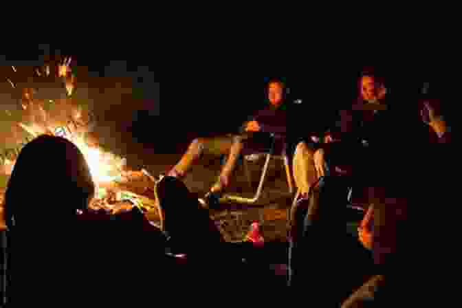 A Vintage Photograph Of A Group Of People Gathered Around A Campfire, Their Faces Illuminated By The Flames Magnetic North Linda Gregerson