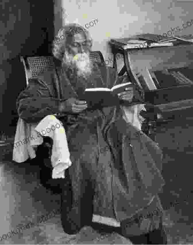 Rabindranath Tagore Smiling And Holding A Book One Night Rabindranath Tagore